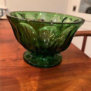 Green glass footed bowl. Very pretty color!